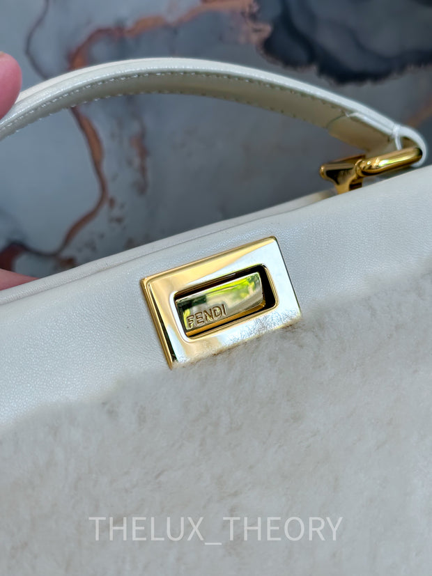 Fendi Pink Ostrich Mini Peekaboo Bag with Gold Hardware. Very Good